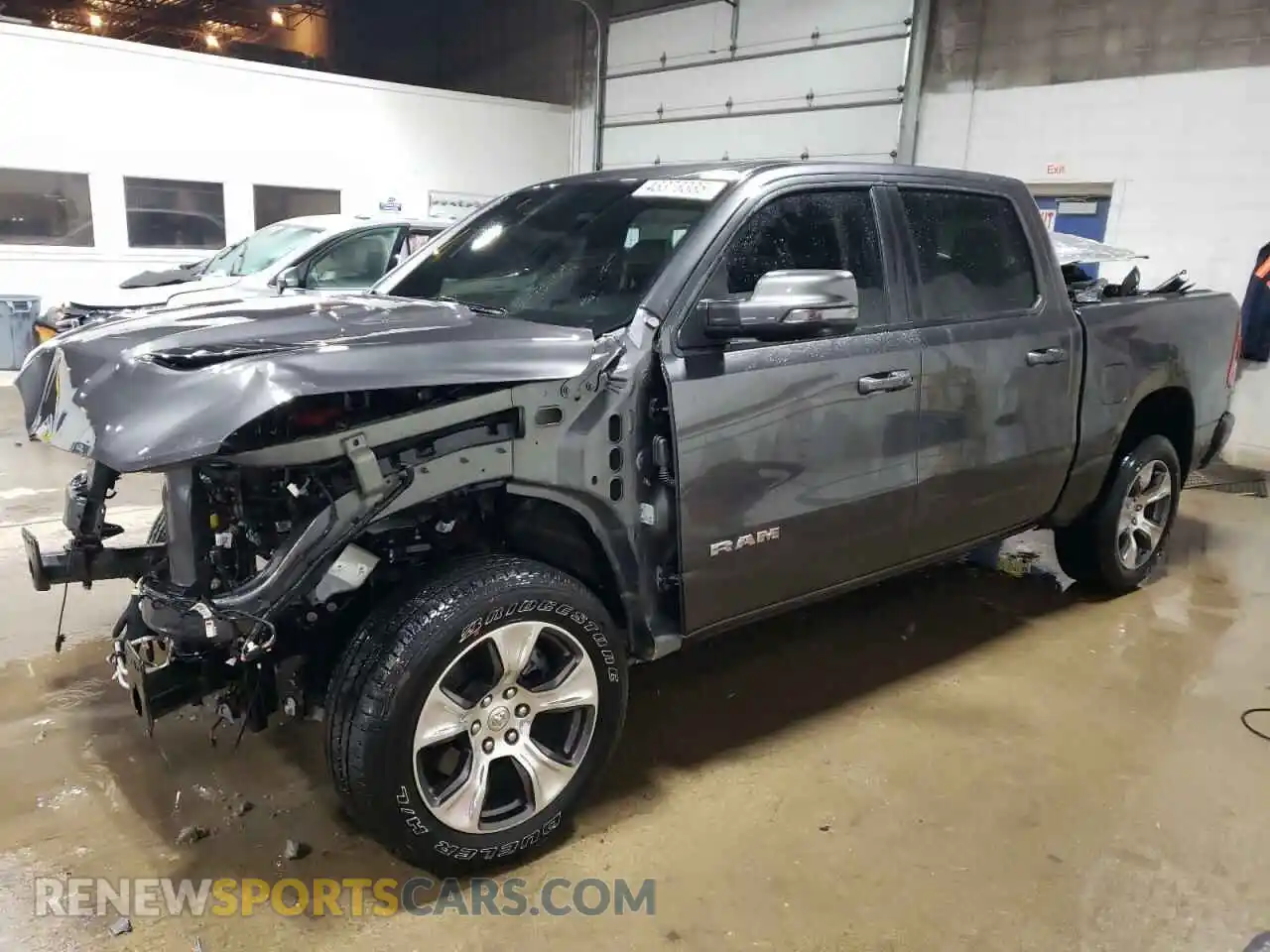 1 Photograph of a damaged car 1C6SRFJT7RN189182 RAM 1500 2024