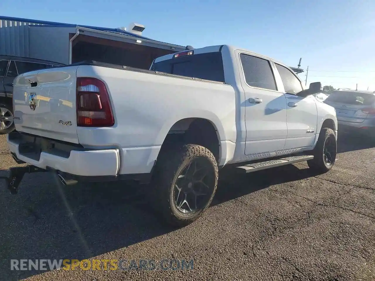 3 Photograph of a damaged car 1C6SRFJT8RN110649 RAM 1500 2024