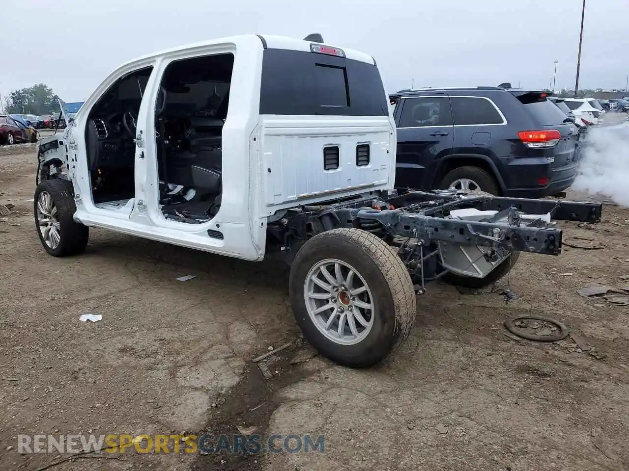2 Photograph of a damaged car 1C6SRFJTXRN116615 RAM 1500 2024