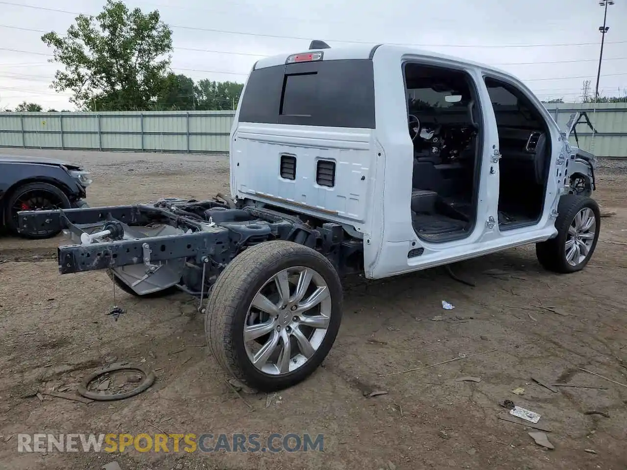 3 Photograph of a damaged car 1C6SRFJTXRN116615 RAM 1500 2024
