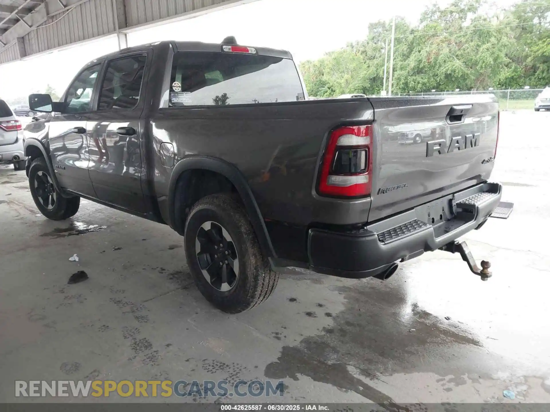 3 Photograph of a damaged car 1C6SRFLT0RN122226 RAM 1500 2024