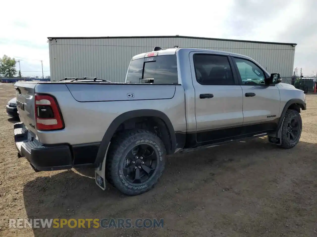 3 Photograph of a damaged car 1C6SRFLT2RN211523 RAM 1500 2024