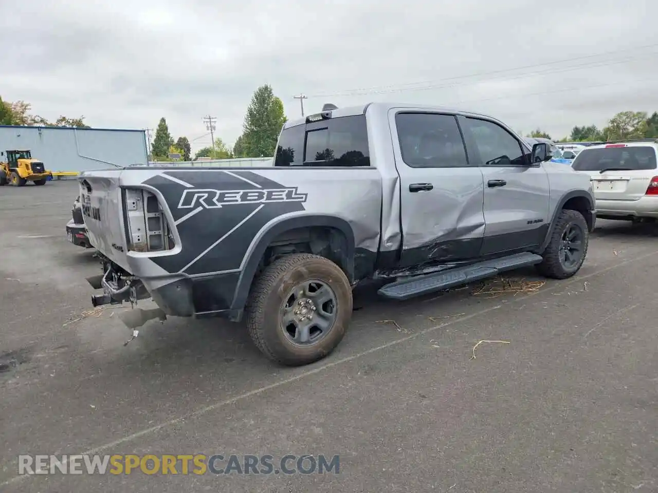 3 Photograph of a damaged car 1C6SRFLTXRN159879 RAM 1500 2024