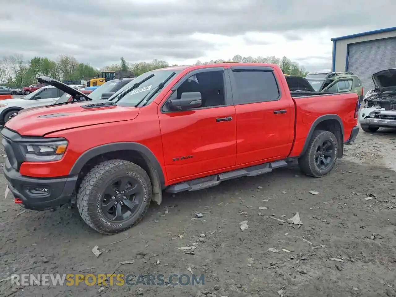 1 Photograph of a damaged car 1C6SRFLTXRN169232 RAM 1500 2024