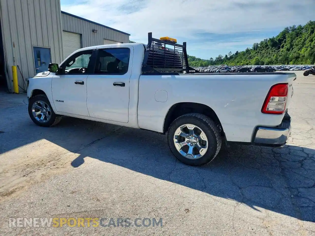 2 Photograph of a damaged car 1C6SRFMT0RN131104 RAM 1500 2024