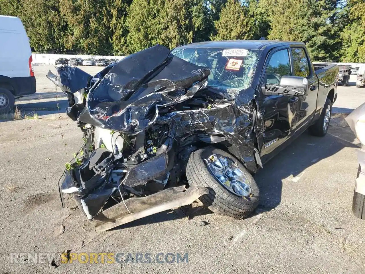 1 Photograph of a damaged car 1C6SRFMT8RN169468 RAM 1500 2024