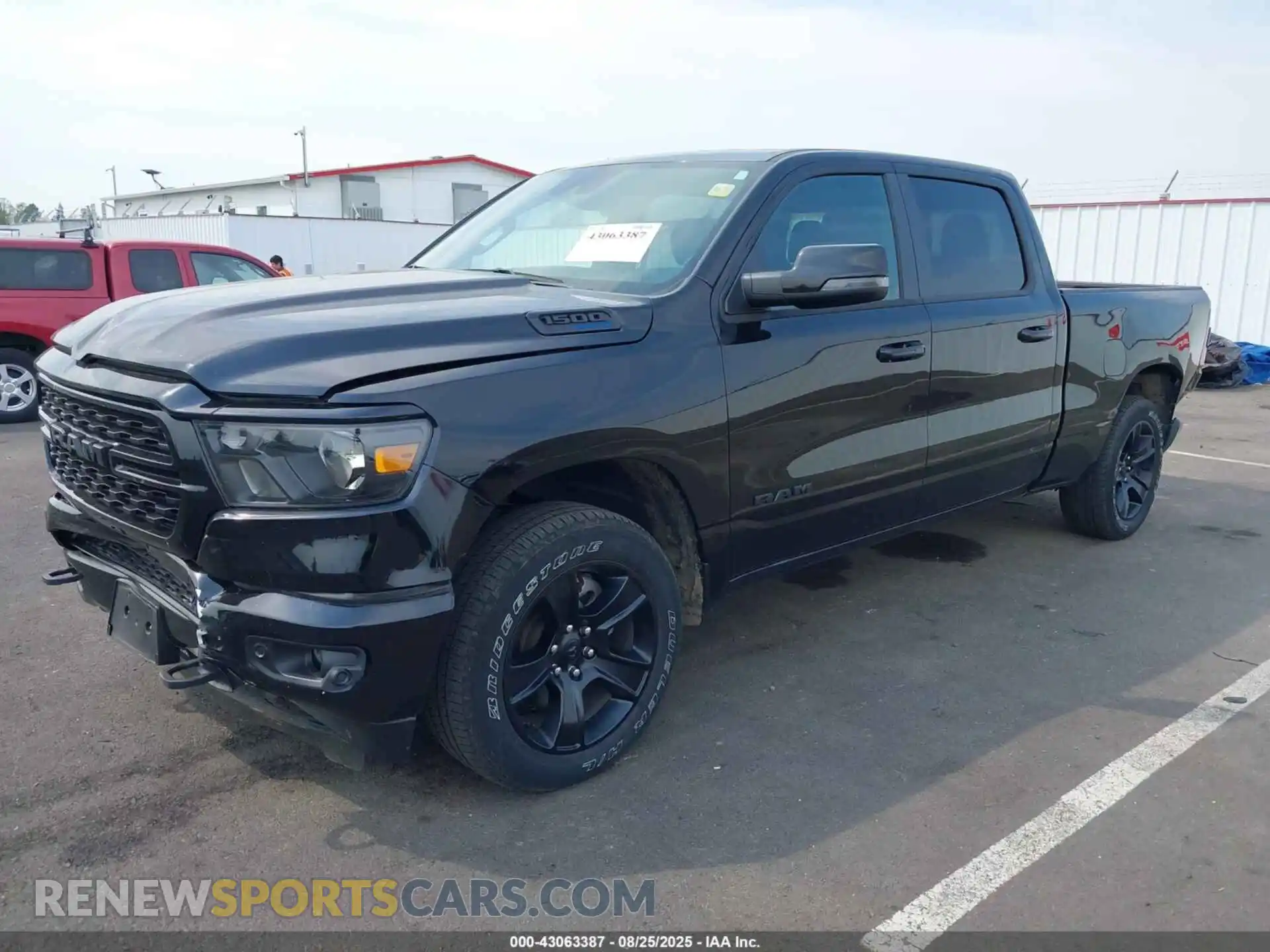 2 Photograph of a damaged car 1C6SRFMT9RN169317 RAM 1500 2024