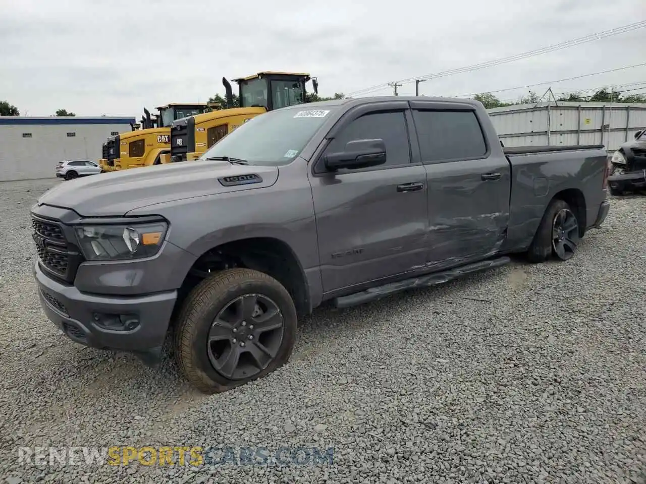 1 Photograph of a damaged car 1C6SRFMTXRN153384 RAM 1500 2024