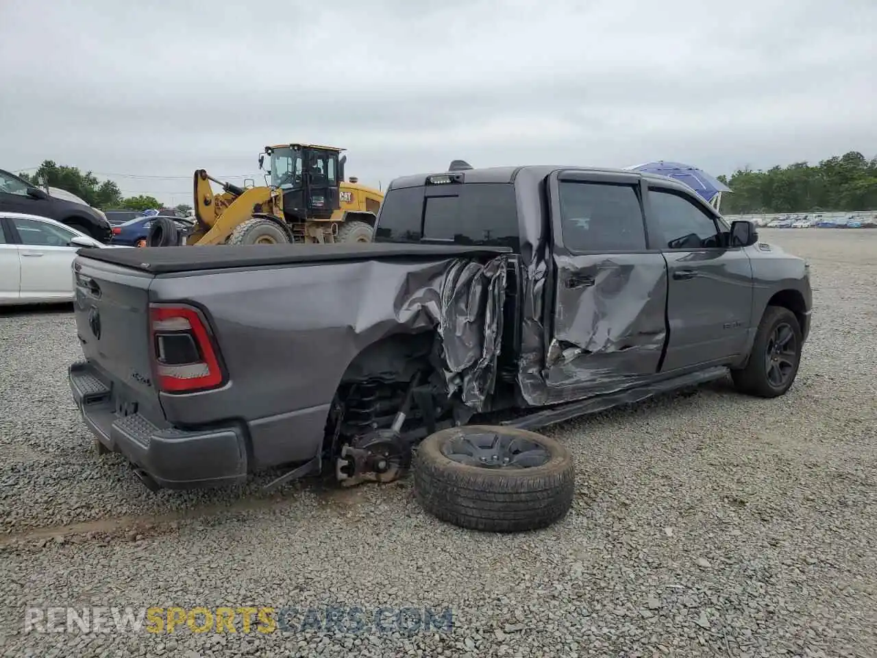 3 Photograph of a damaged car 1C6SRFMTXRN153384 RAM 1500 2024