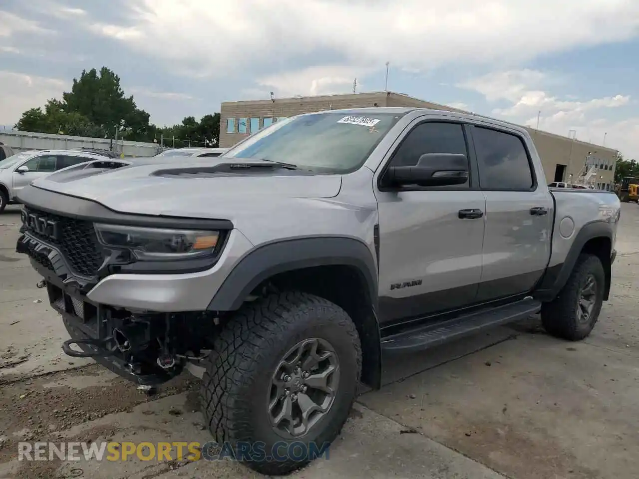 1 Photograph of a damaged car 1C6SRFU90RN223530 RAM 1500 2024
