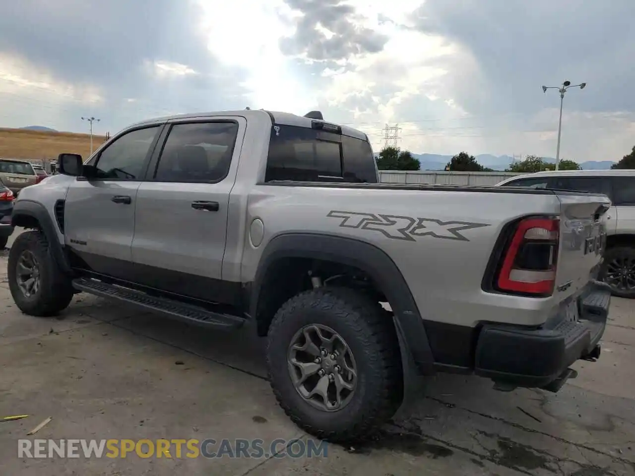 2 Photograph of a damaged car 1C6SRFU90RN223530 RAM 1500 2024