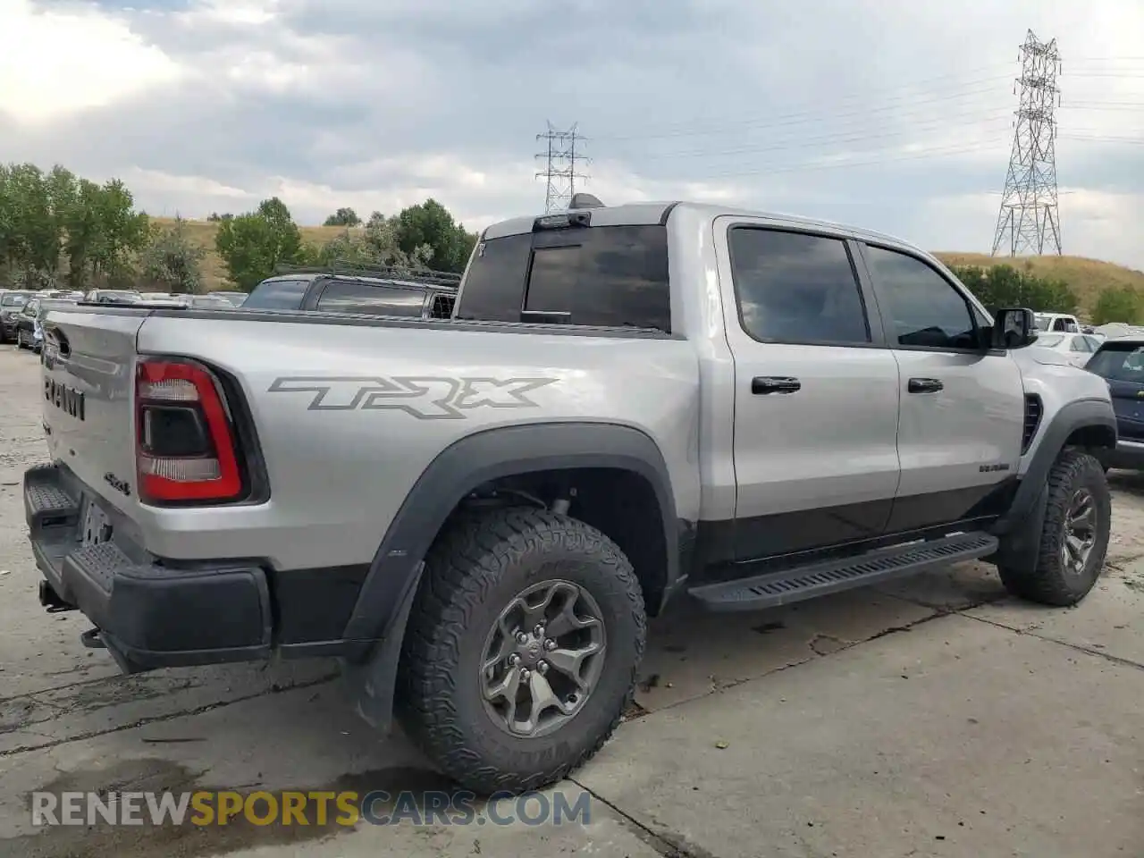 3 Photograph of a damaged car 1C6SRFU90RN223530 RAM 1500 2024