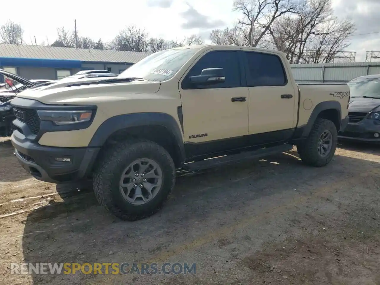 1 Photograph of a damaged car 1C6SRFU94RN170556 RAM 1500 2024
