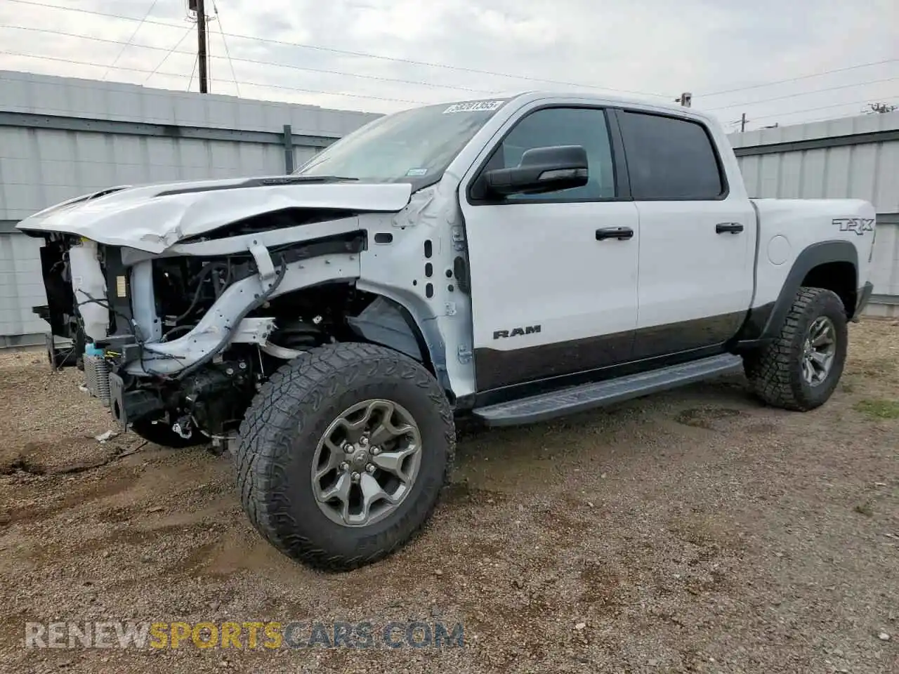 1 Photograph of a damaged car 1C6SRFU95RN170551 RAM 1500 2024