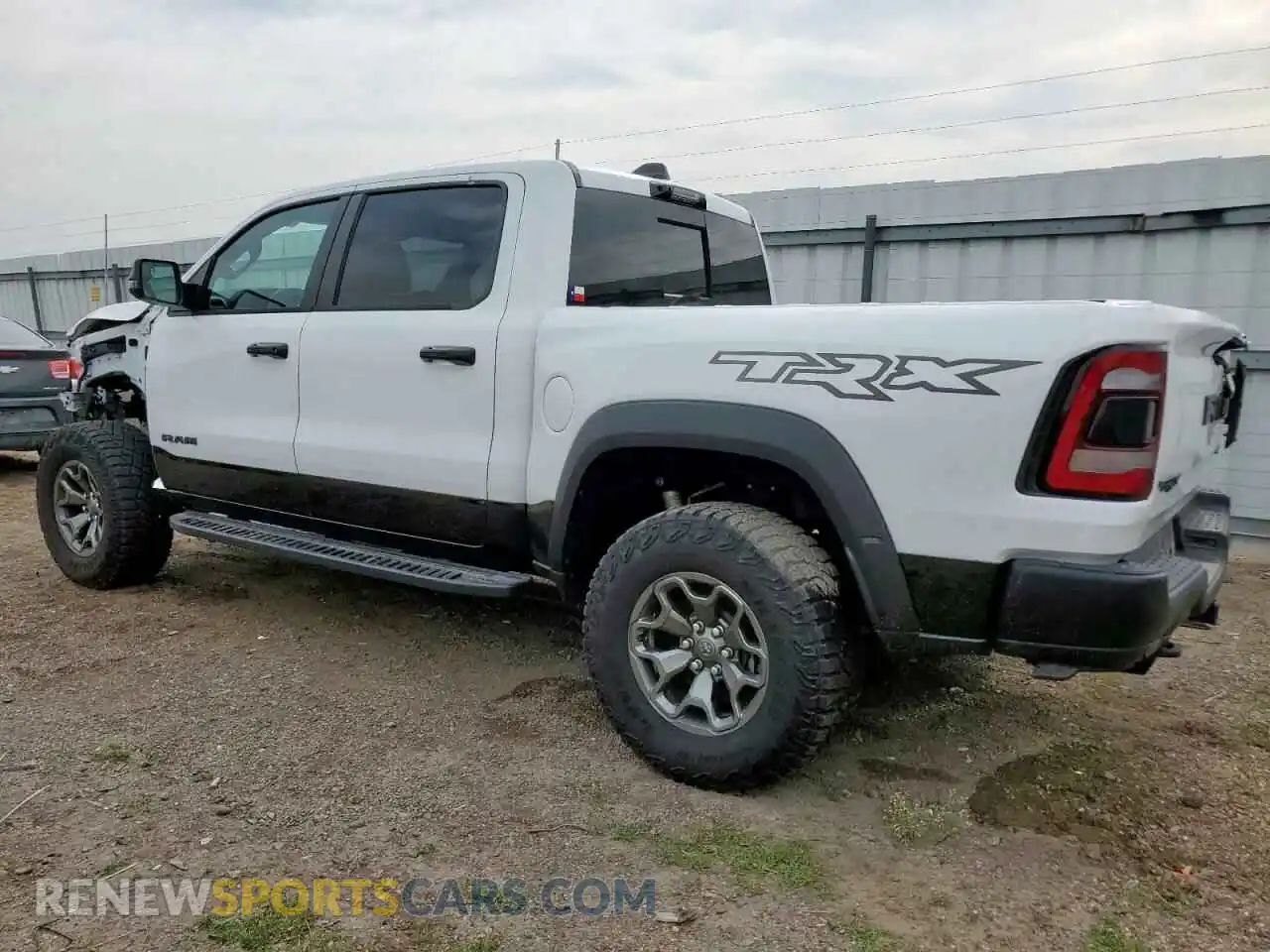 2 Photograph of a damaged car 1C6SRFU95RN170551 RAM 1500 2024