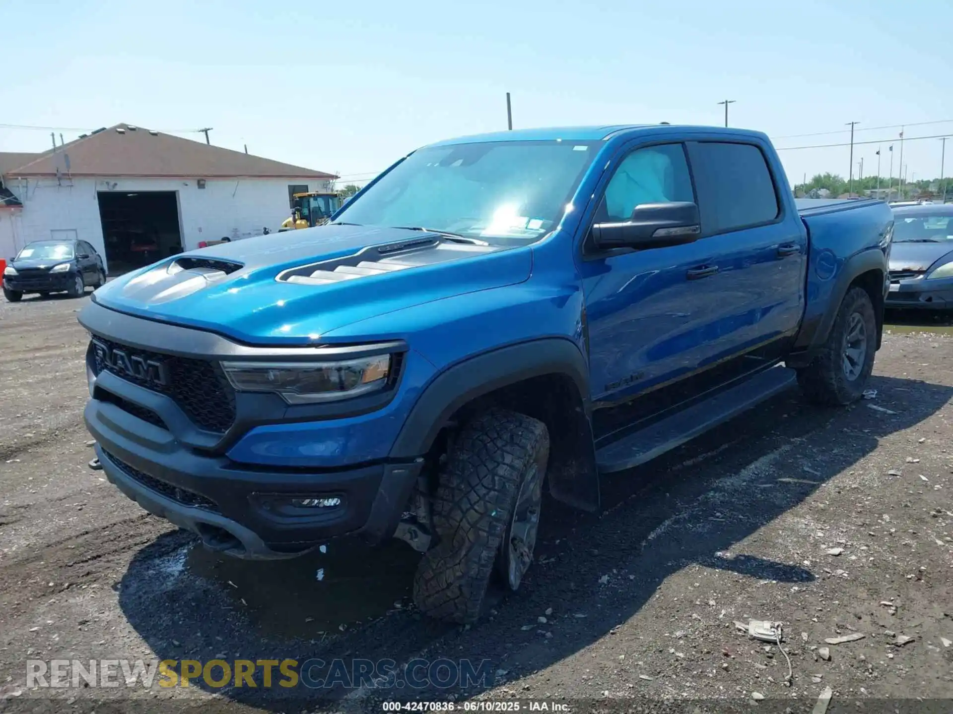 2 Photograph of a damaged car 1C6SRFU95RN187320 RAM 1500 2024