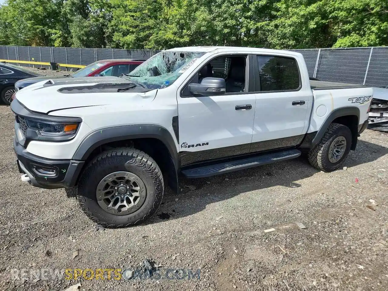 1 Photograph of a damaged car 1C6SRFU98RN201680 RAM 1500 2024