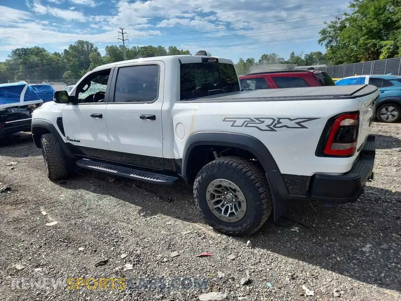 2 Photograph of a damaged car 1C6SRFU98RN201680 RAM 1500 2024
