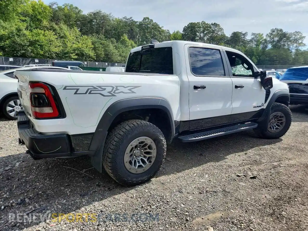 3 Photograph of a damaged car 1C6SRFU98RN201680 RAM 1500 2024