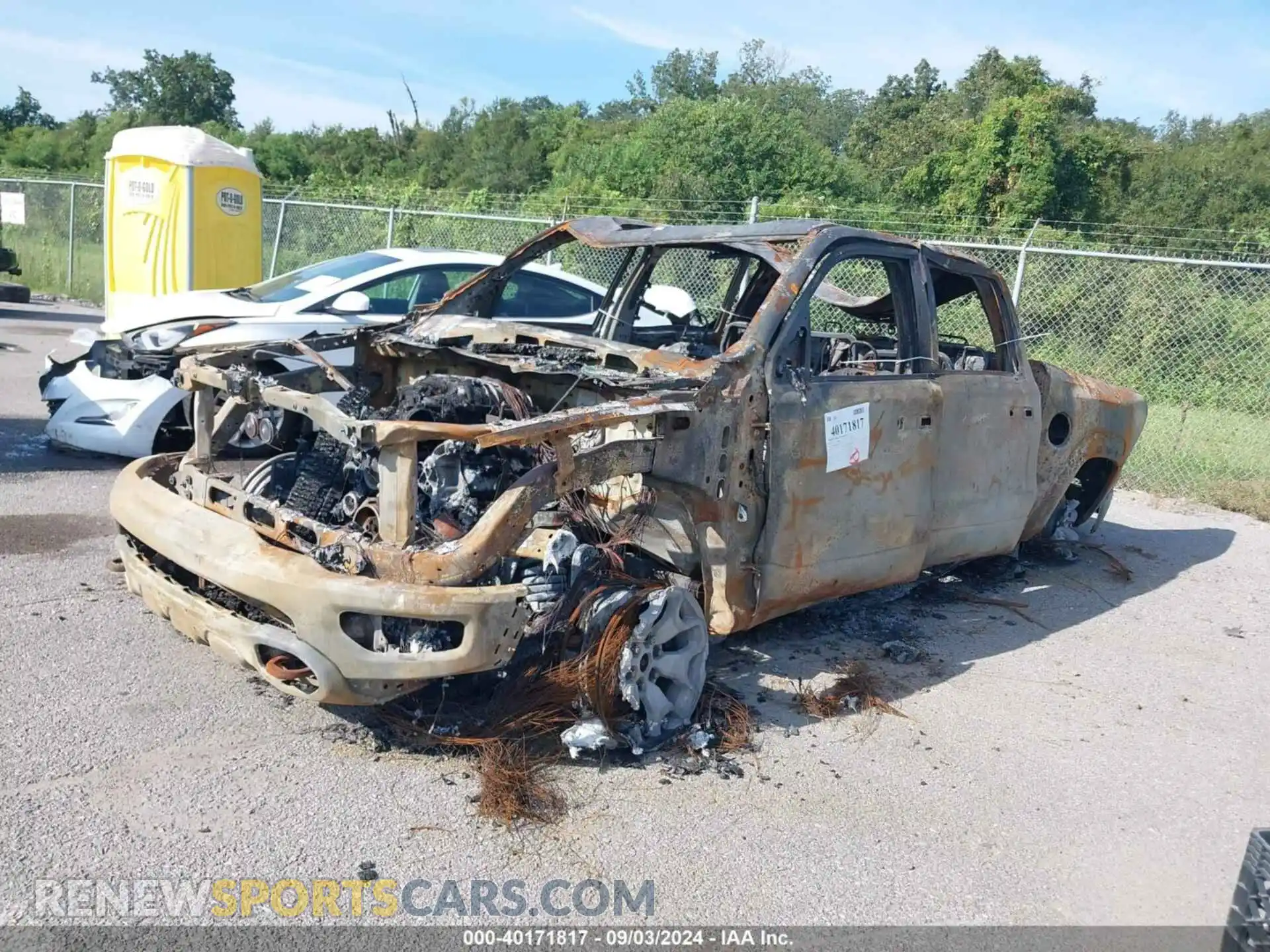 2 Photograph of a damaged car 1C6SRFU9XRN113794 RAM 1500 2024