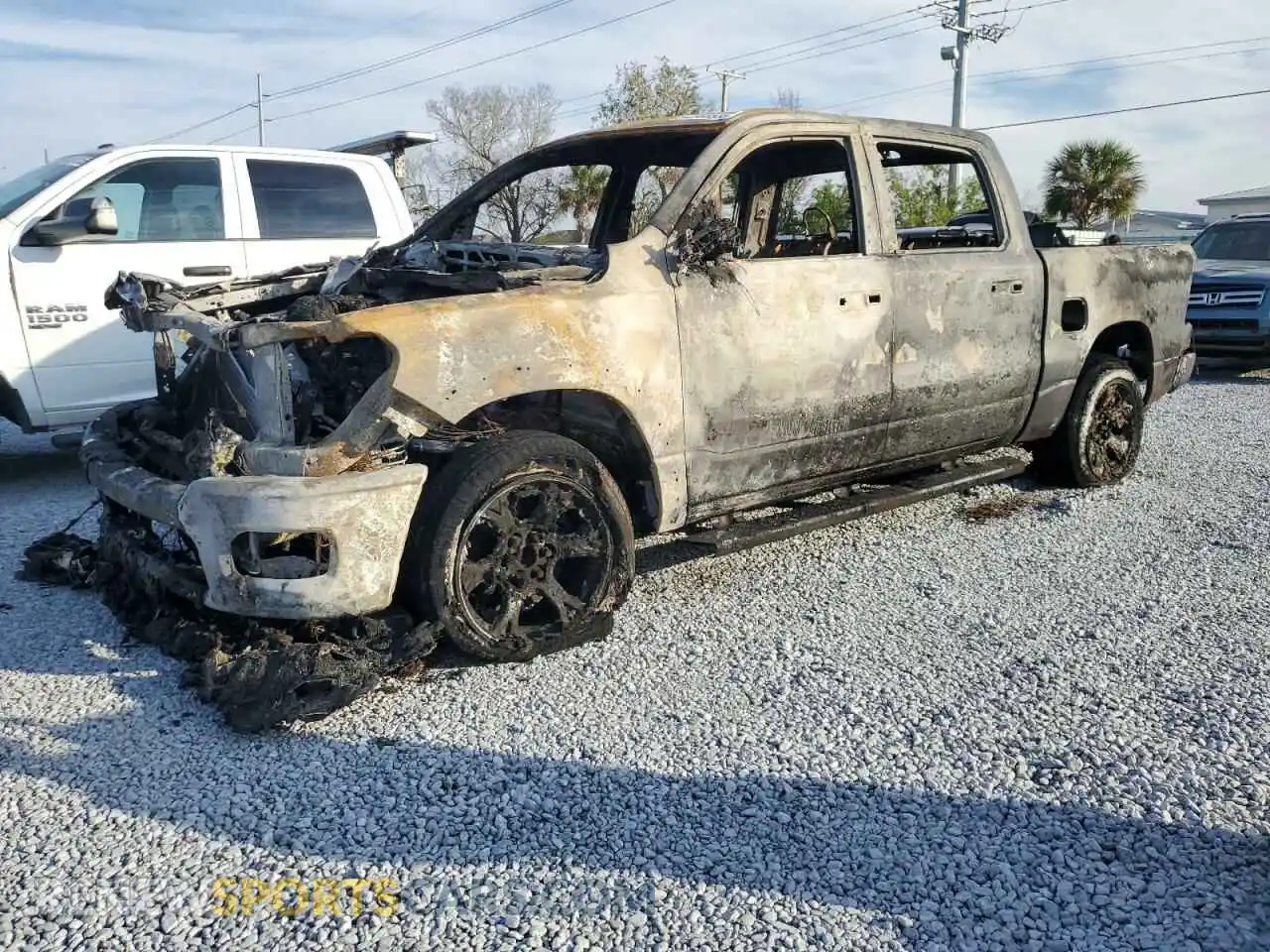 1 Photograph of a damaged car 1C6RREFP8SN593313 RAM 1500 2025