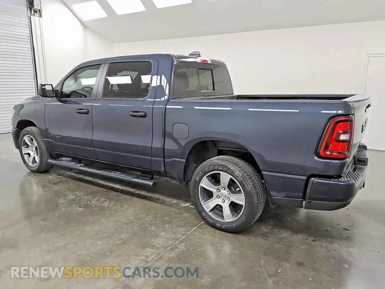 2 Photograph of a damaged car 1C6RREGGXSN222605 RAM 1500 2025