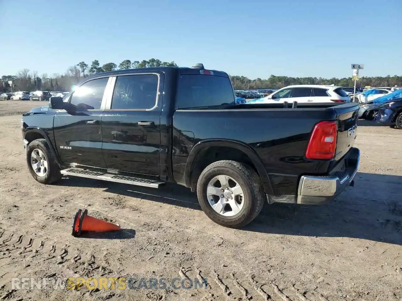 2 Photograph of a damaged car 1C6RRFFG0SN509944 RAM 1500 2025