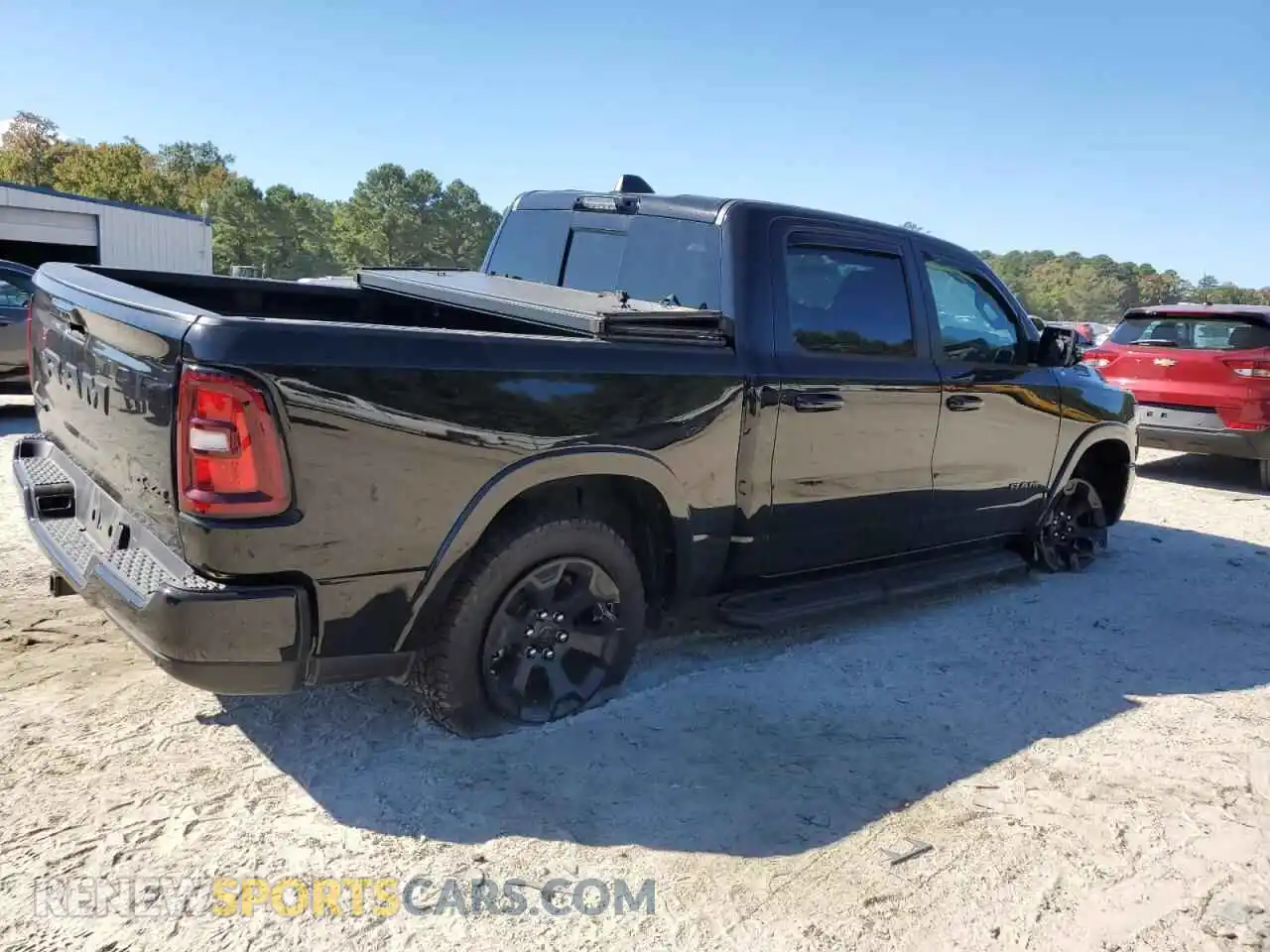 3 Photograph of a damaged car 1C6RRFFG4SN635837 RAM 1500 2025