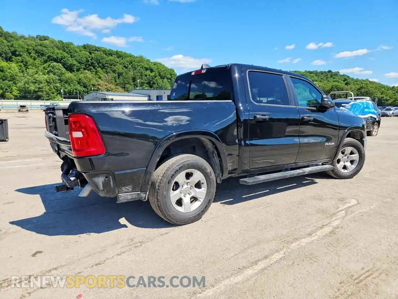 3 Photograph of a damaged car 1C6RRFFG7SN535330 RAM 1500 2025