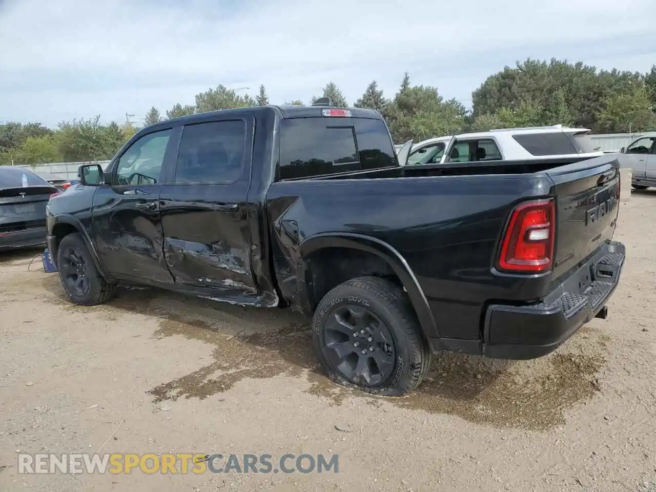 2 Photograph of a damaged car 1C6RRFFG9SN693068 RAM 1500 2025