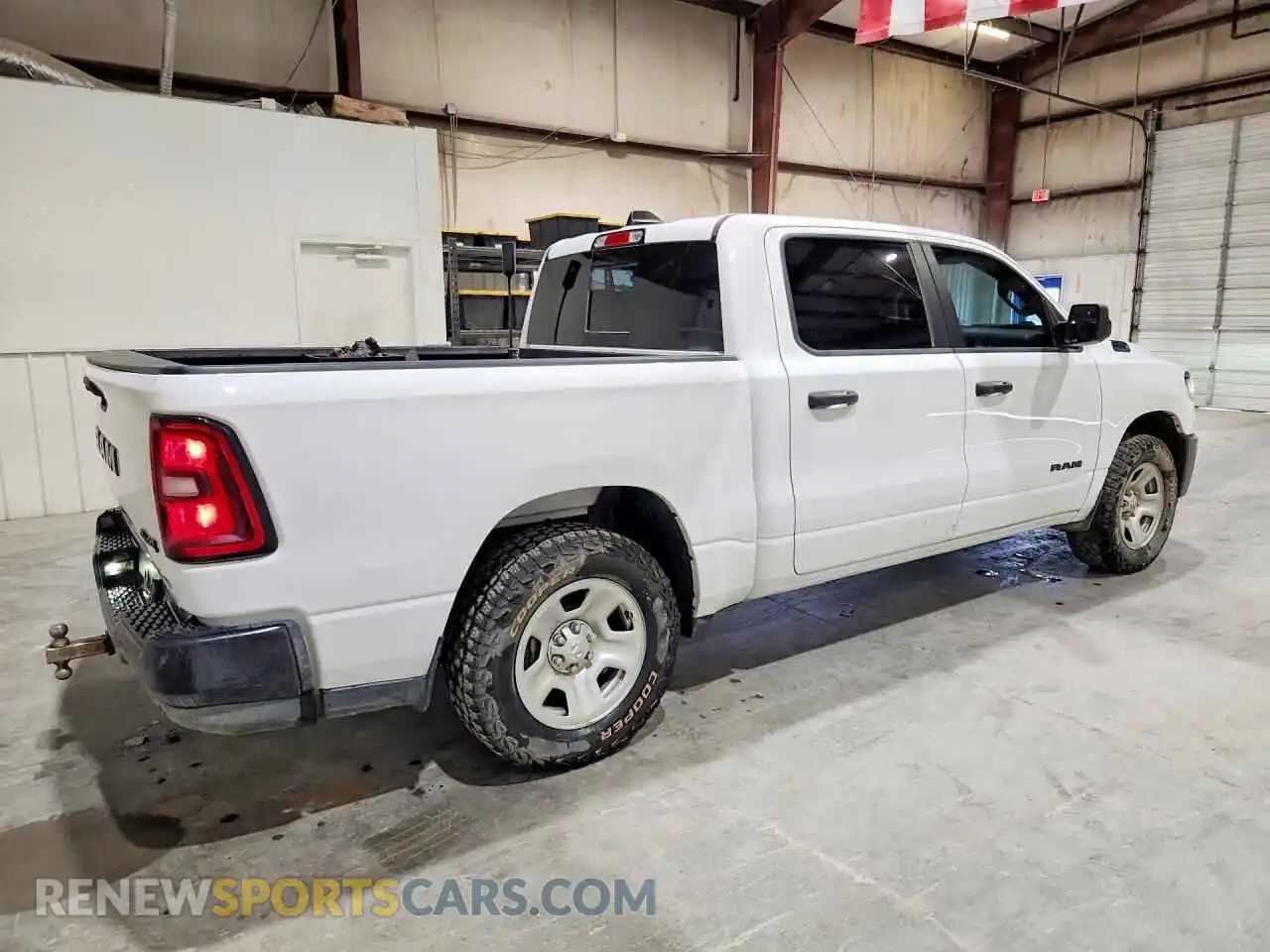3 Photograph of a damaged car 1C6RRFGG7SN587295 RAM 1500 2025