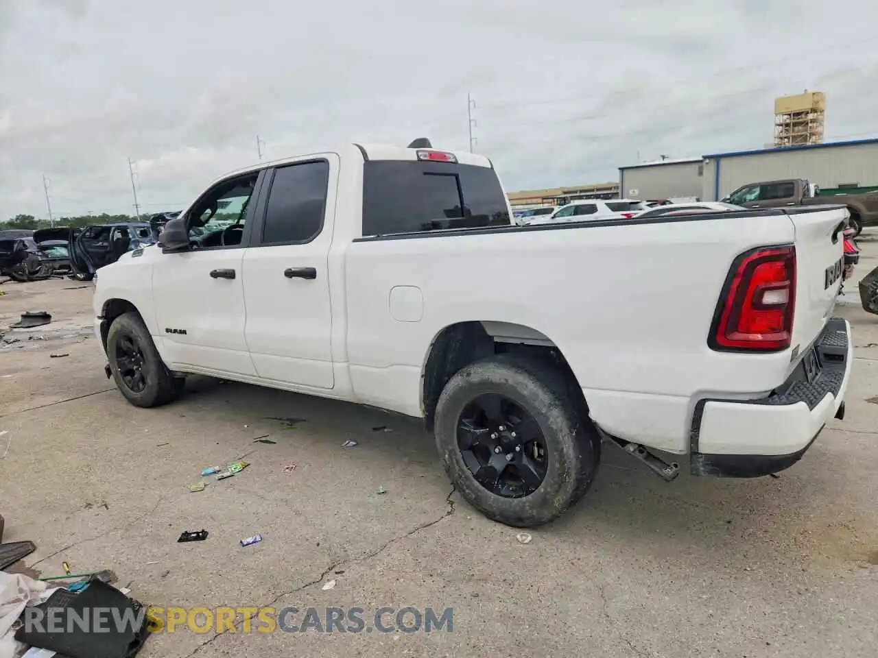 2 Photograph of a damaged car 1C6SRECGXSN590838 RAM 1500 2025