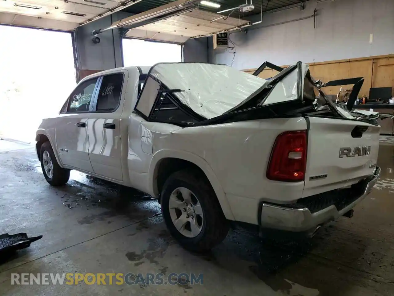 2 Photograph of a damaged car 1C6SRFBP8SN647853 RAM 1500 2025
