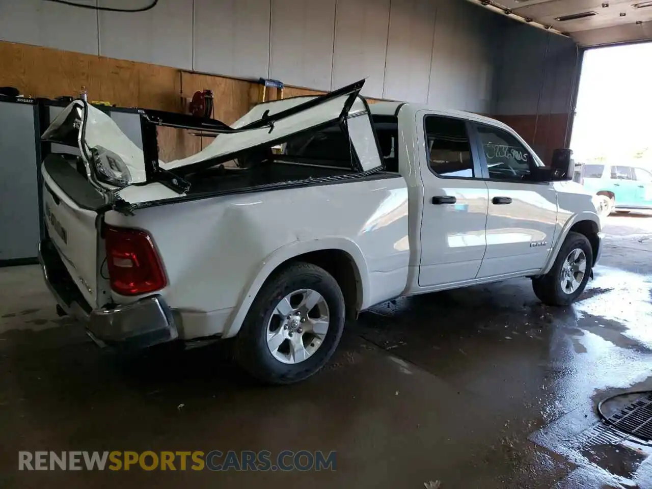 3 Photograph of a damaged car 1C6SRFBP8SN647853 RAM 1500 2025