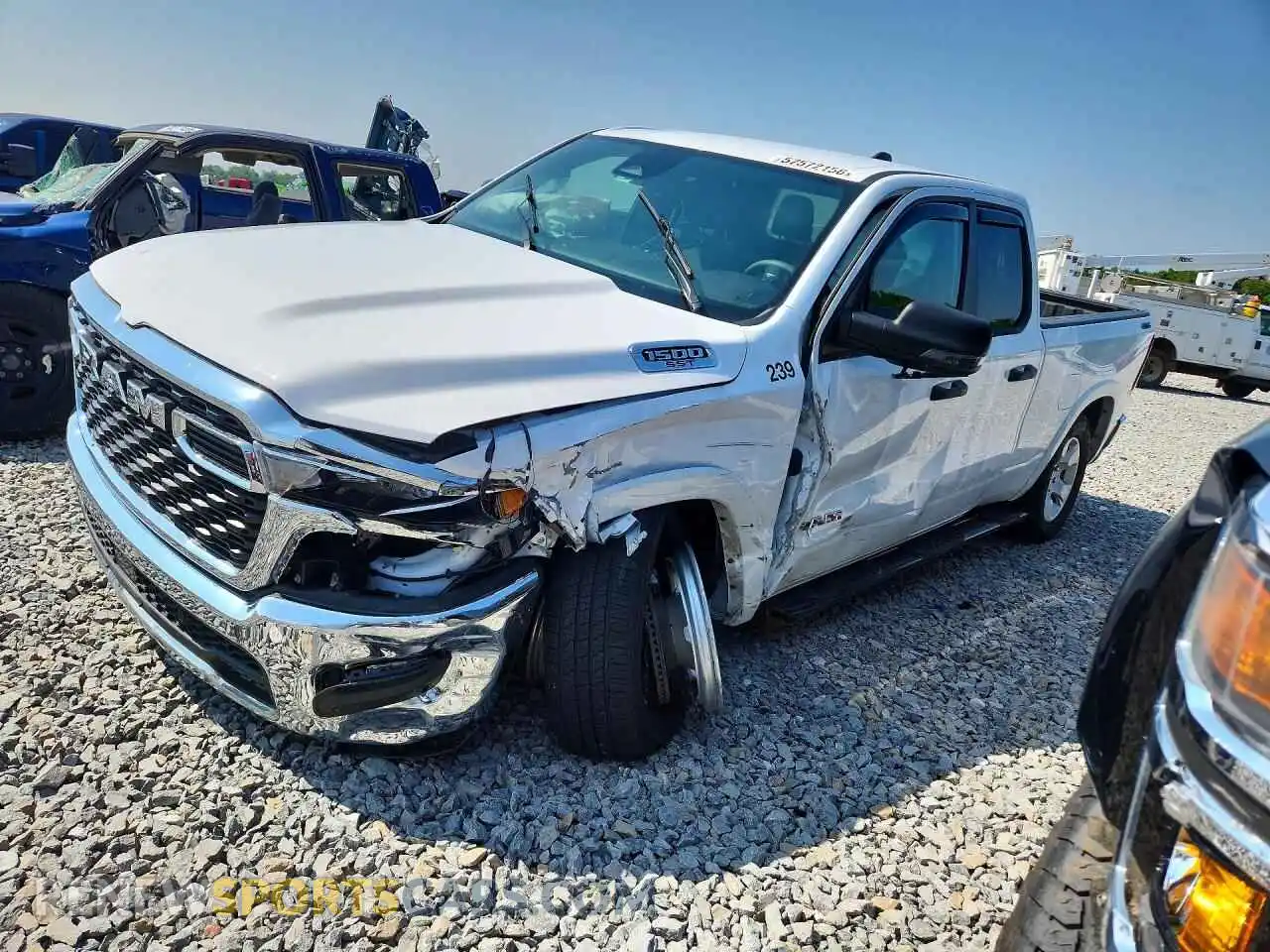 1 Photograph of a damaged car 1C6SRFBP8SN728111 RAM 1500 2025