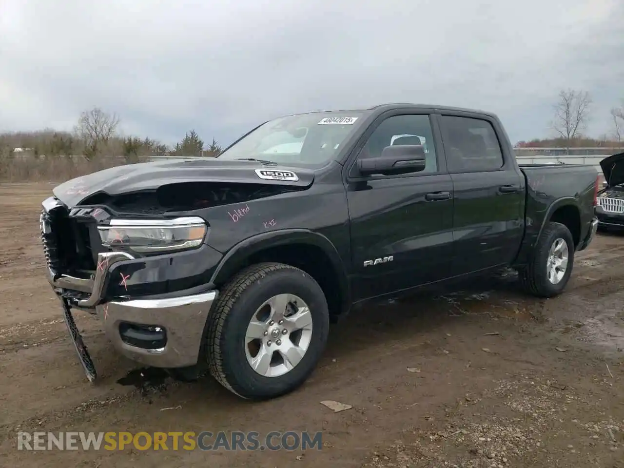 1 Photograph of a damaged car 1C6SRFFP0SN559311 RAM 1500 2025