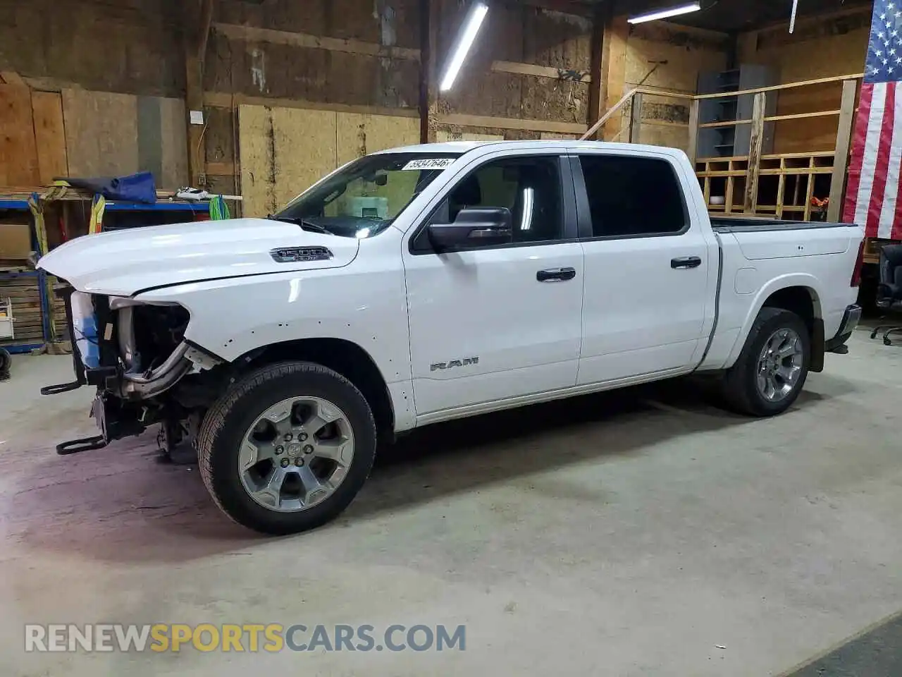1 Photograph of a damaged car 1C6SRFFP0SN696071 RAM 1500 2025