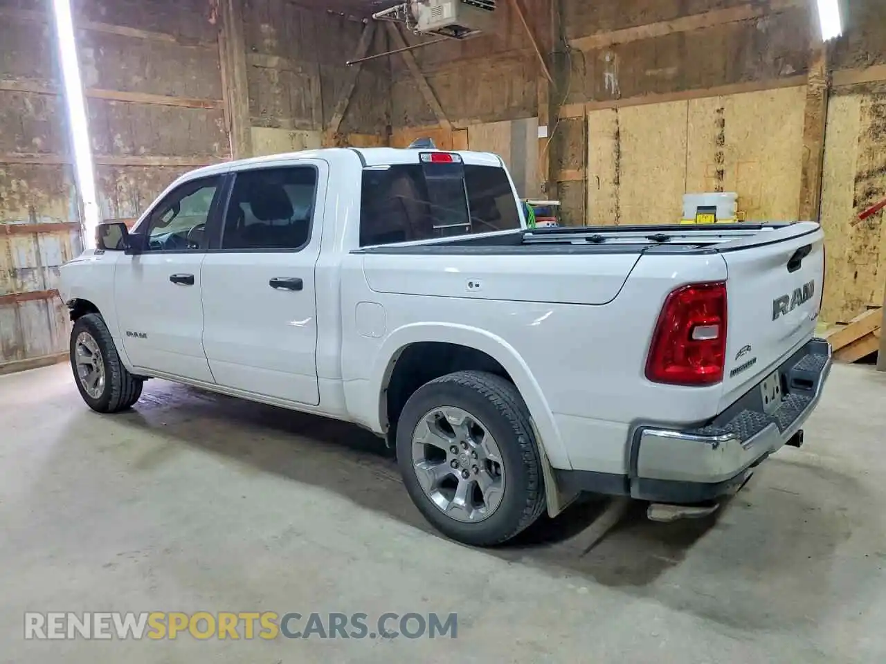 2 Photograph of a damaged car 1C6SRFFP0SN696071 RAM 1500 2025
