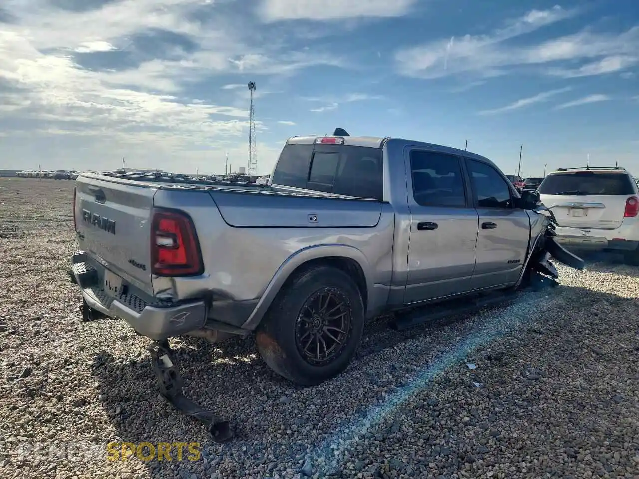 3 Photograph of a damaged car 1C6SRFFP1SN554473 RAM 1500 2025