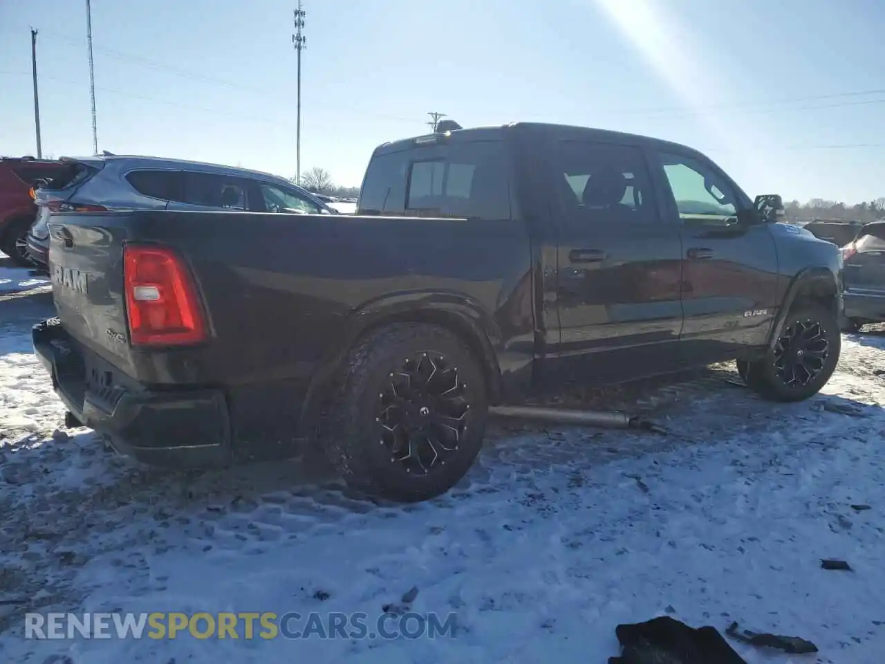 3 Photograph of a damaged car 1C6SRFFP2SN518355 RAM 1500 2025