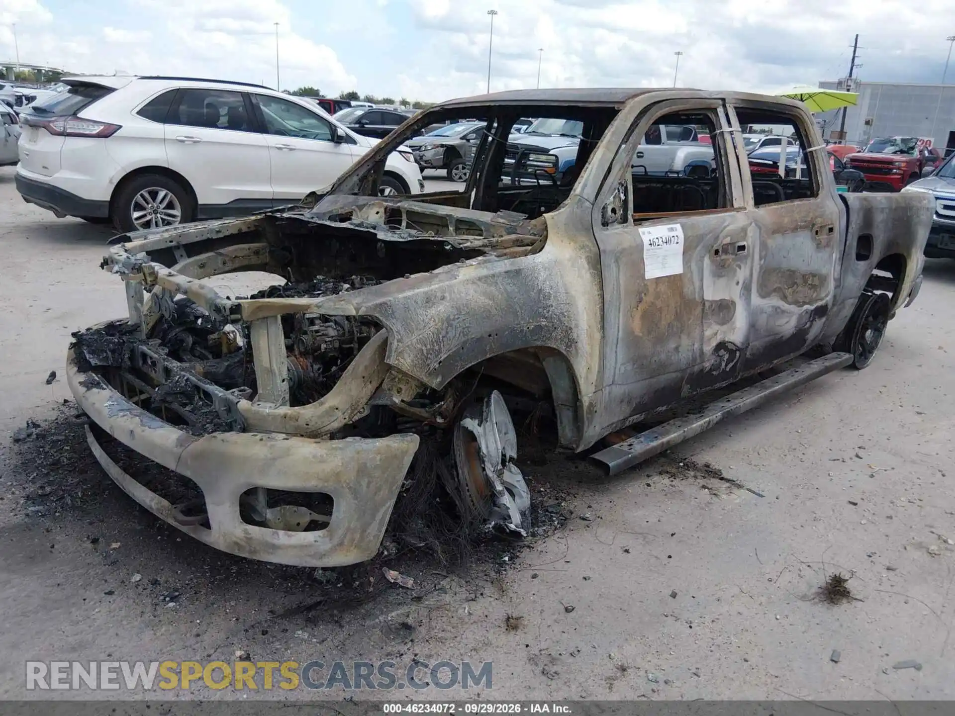 2 Photograph of a damaged car 1C6SRFFP3SN559710 RAM 1500 2025