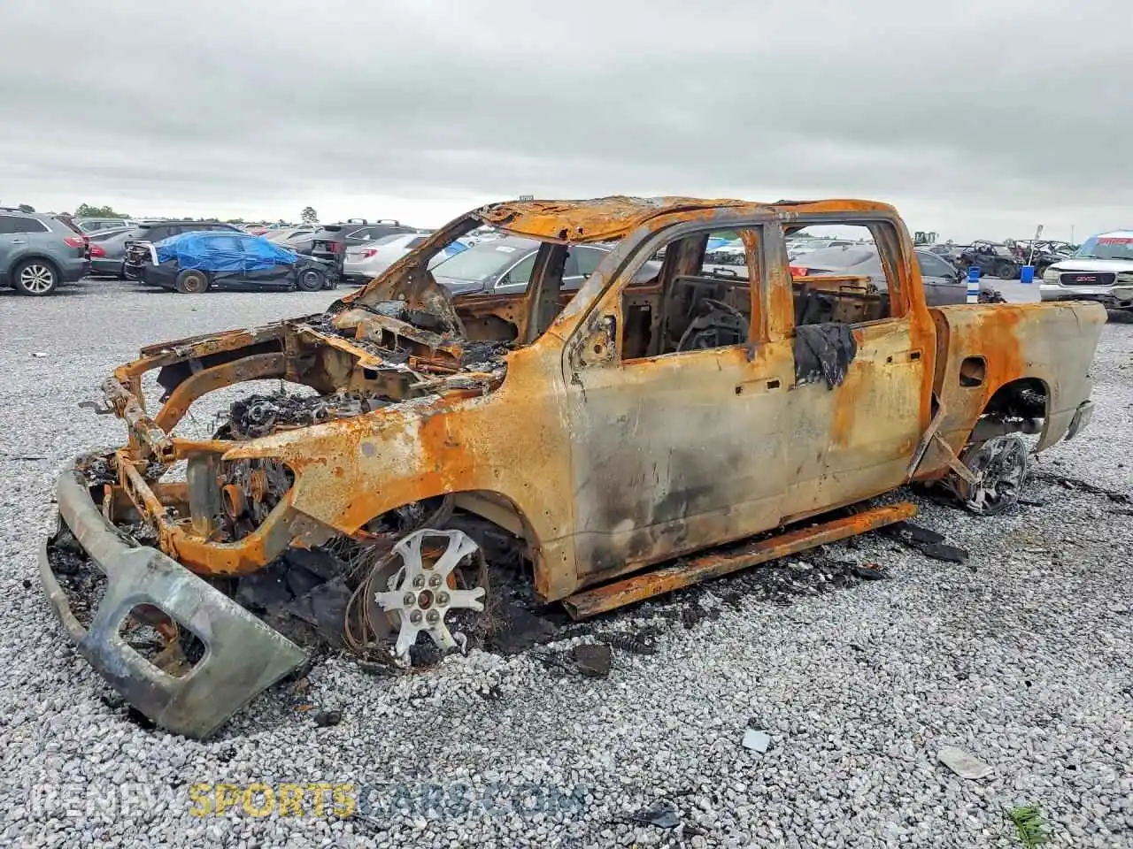 1 Photograph of a damaged car 1C6SRFFP3SN601843 RAM 1500 2025