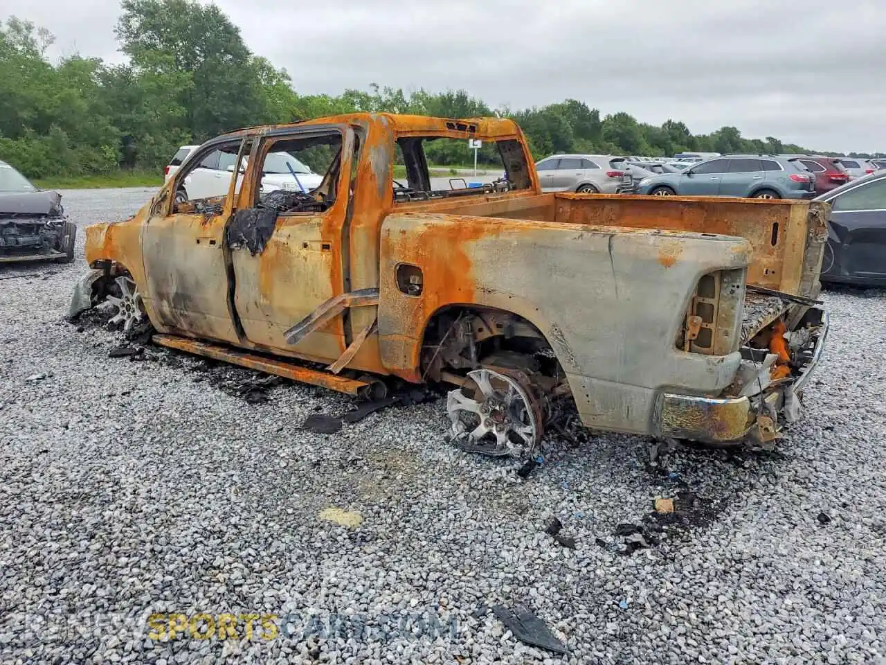 2 Photograph of a damaged car 1C6SRFFP3SN601843 RAM 1500 2025