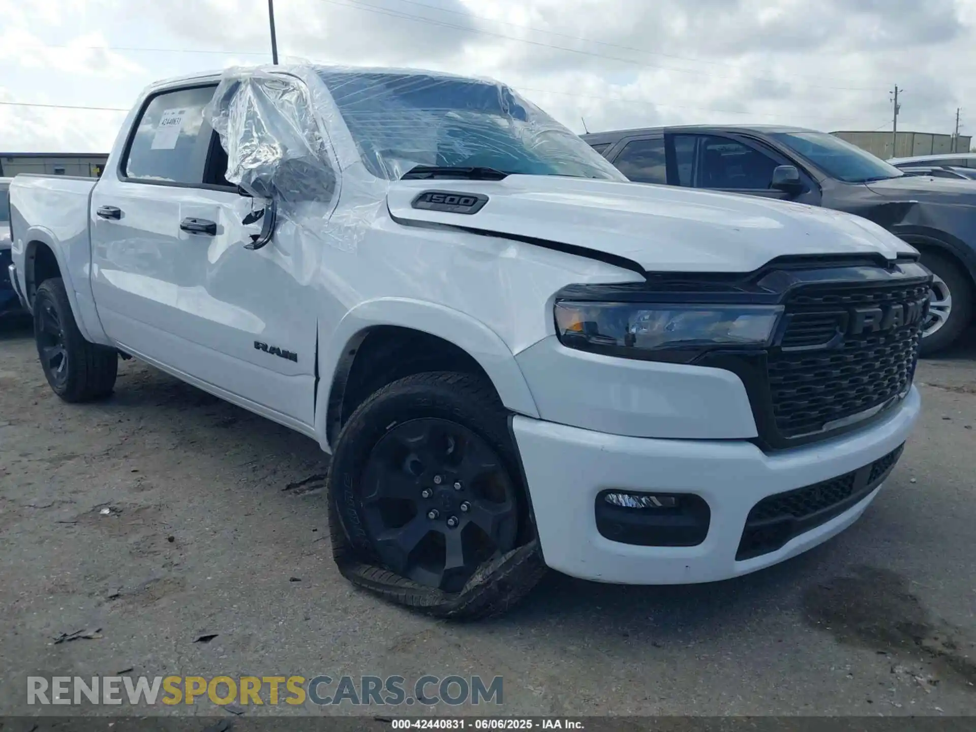 1 Photograph of a damaged car 1C6SRFFP4SN560686 RAM 1500 2025