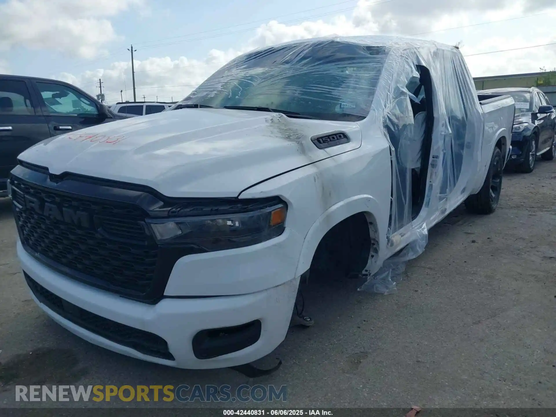 2 Photograph of a damaged car 1C6SRFFP4SN560686 RAM 1500 2025
