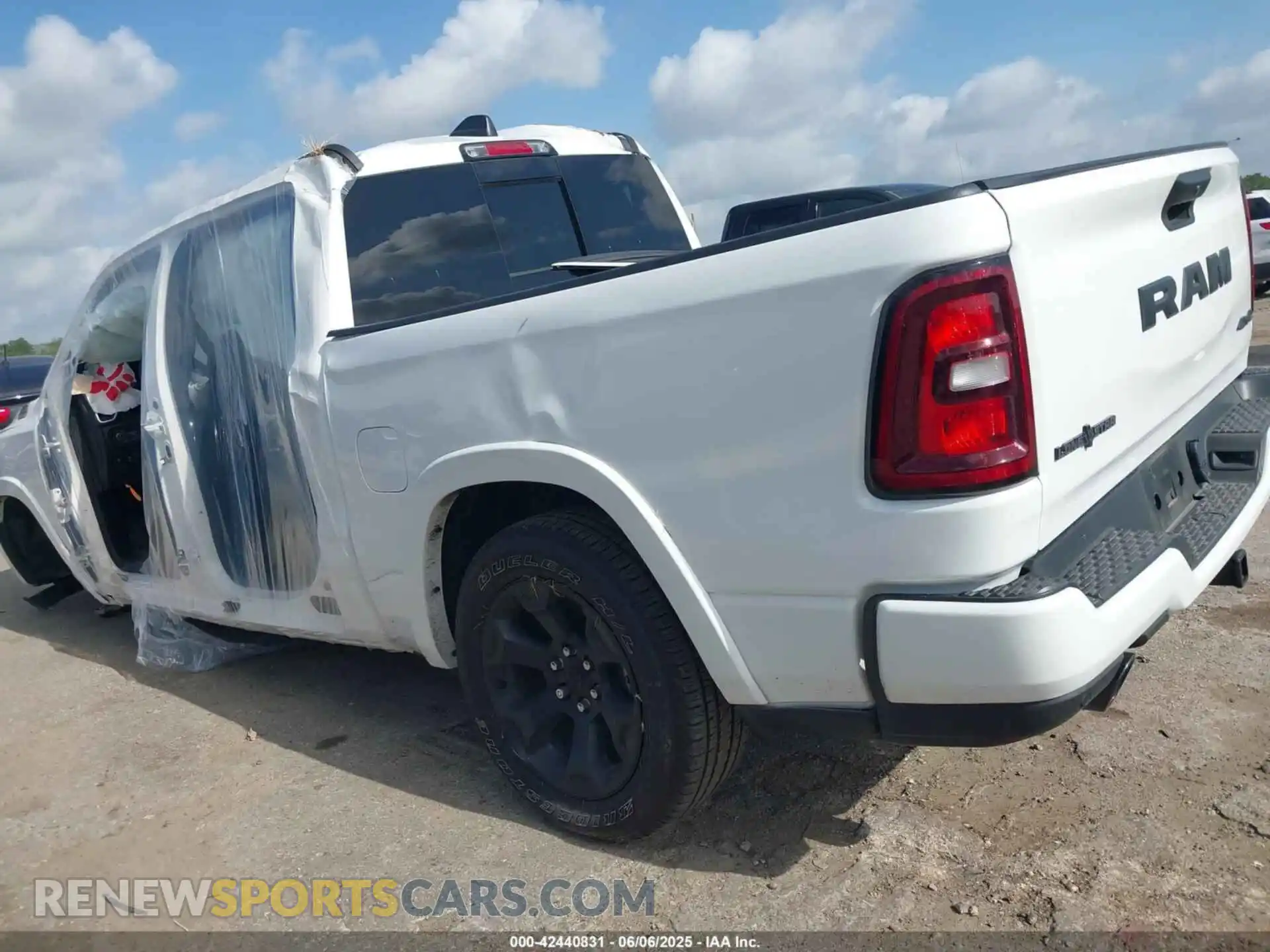 3 Photograph of a damaged car 1C6SRFFP4SN560686 RAM 1500 2025
