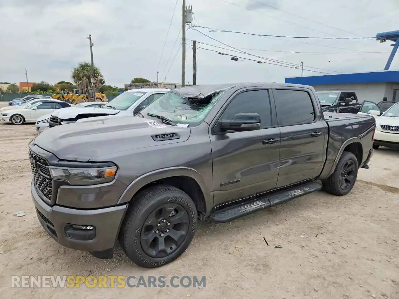 1 Photograph of a damaged car 1C6SRFFP6SN702777 RAM 1500 2025