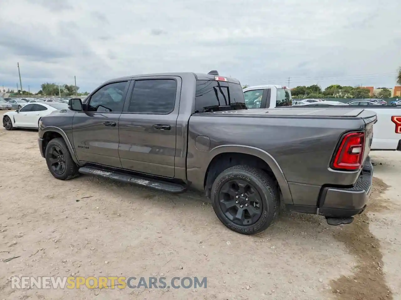 2 Photograph of a damaged car 1C6SRFFP6SN702777 RAM 1500 2025