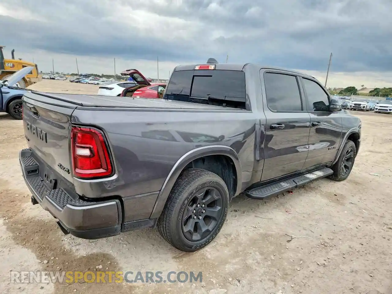 3 Photograph of a damaged car 1C6SRFFP6SN702777 RAM 1500 2025