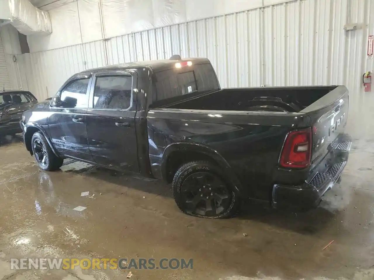 2 Photograph of a damaged car 1C6SRFFP8SN625765 RAM 1500 2025